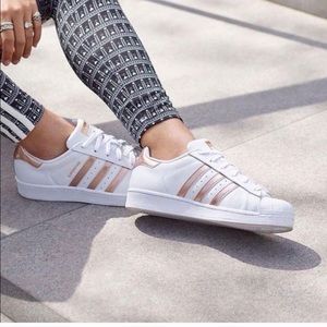 white adidas shoes with rose gold